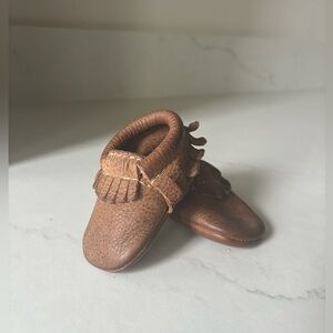 Freshly picked newborn size 0 moccasins brown weathered